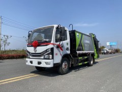 邯郸客户订购的东风6方多利卡后装压缩垃圾车发车