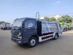 北京朝阳区黄总订购的6方压缩式垃圾车今日发往指定地点交车