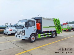 大庆市黄总来厂订购一台东风压缩式垃圾车报价13.6万